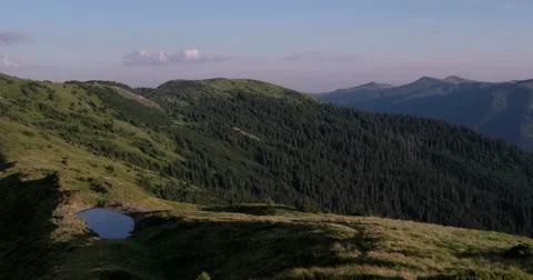 Clouds Time Lapse Pan Over Mountain Range 動画素材 65411943