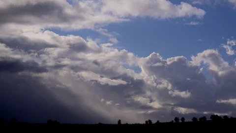Clouds time lapse of rain on coast of England UK 4K Video stock 102619198
