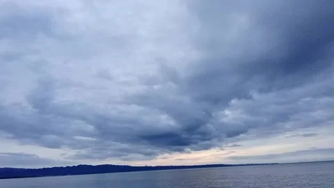 Clouds, time lapse, sea, mountains, island. Stock Footage 326224457