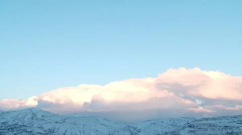 Clouds Time Lapse in a snowy mountain Stock Footage 11118640