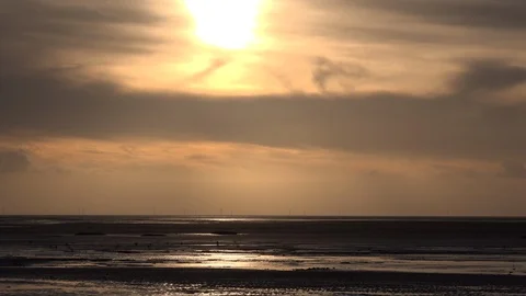 Clouds time lapse sunset over ocean lifting 4K Video stock 124649971