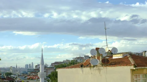 Clouds time lapse on Uskudar, Istanbul. Minaret, Mosque, roofs of buildings. Stock Footage 132574247