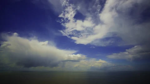 Clouds Timelapse Horizon Fluffy Blue Wide Angle 12mm 4K Video stock 67961281