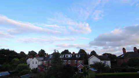 Clouds Timelapse Light Fades in coloured Sky Above Rooftops Stock-Footage 72840851