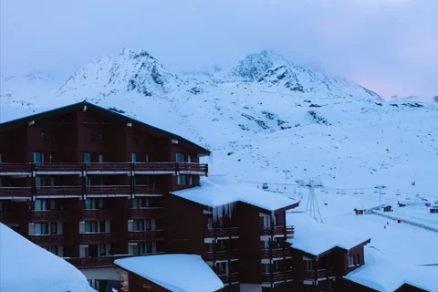 Clouds timelapse over the alps in val thorens France Stock Footage 235020406