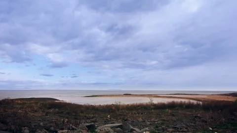 Clouds timelapse over the lake Video stock 84332874