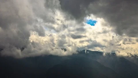 Clouds timelapse over mountains Stock Footage 93781182