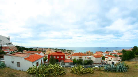 Clouds timelapse over village on a seashore. Stock Footage 25007697