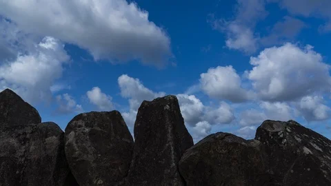 Clouds timelapse with rocks in foreground in 8K 02 Stock Footage 100541186