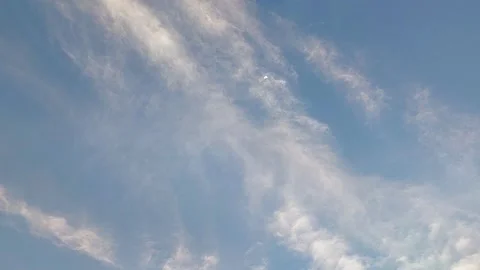 Clouds timelapse in the sky. Cloudscape motion and moon Stock Footage 260453605