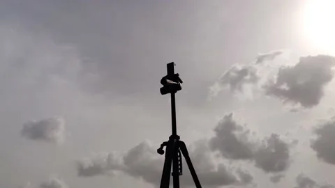 Clouds timelapse with tripod in the frame. Stock Footage 155849029