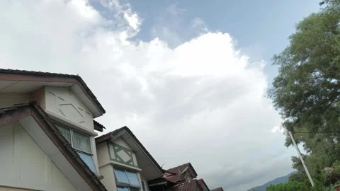 Clouds timelapse view with houses Video stock 158558922