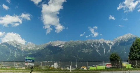 Clouds traveling over the mountains Stockbeeldmateriaal 84179424