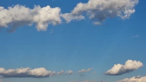 Clouds travelling in layers blue summer sky weather Stock Footage 272401782