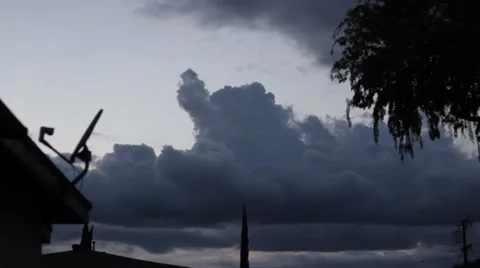 Clouds with tree on right and house on left Stock Footage 47523028