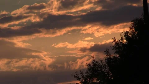 Clouds trees and sunset Video stock 137657087