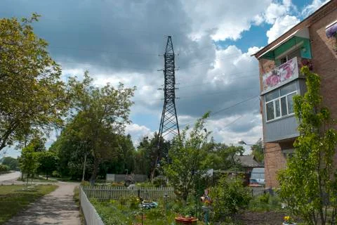 Clouds trees house Stock Photos