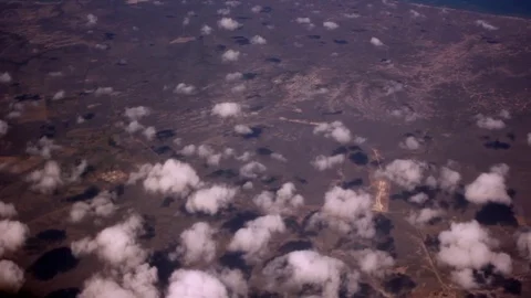 Clouds trou Airplane window Stock Footage 80663317
