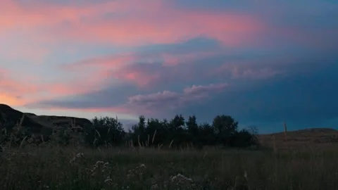 Clouds Turning Pink at Sunset Timelapse 스톡 동영상 257711072