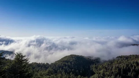 Clouds under the Mountains Timelapse  Stock Footage 153717233