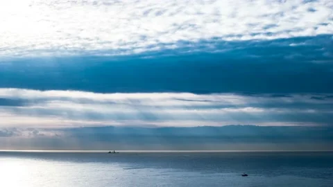 Clouds under the sun above the sea. Time lapse 스톡 동영상 145739212