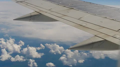 Clouds under the wing of the aircraft. Stock Footage 265482991