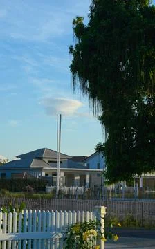 Clouds unreal form on background blue sky Stock Photos