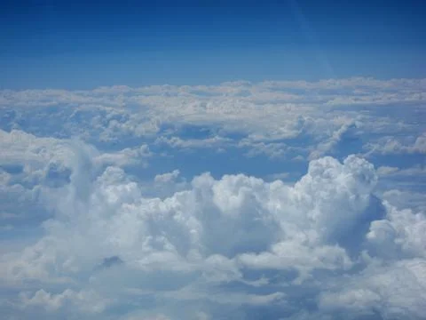 Clouds in view from airplane Stock Photos