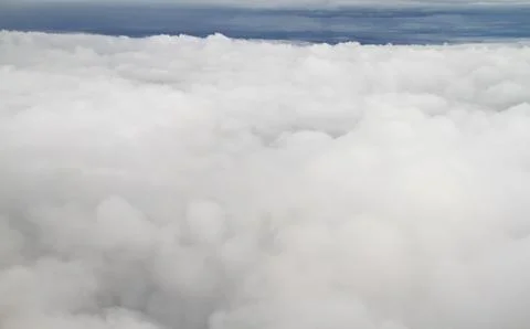 Clouds. view from the window of an airplane flying in the clouds Stock Photos