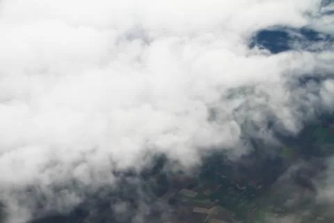 Clouds. view from the window of an airplane flying in the clouds Stock Photos