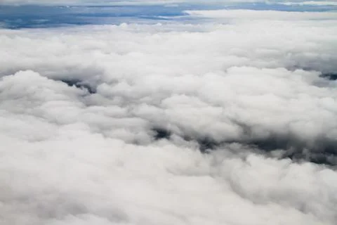 Clouds. view from the window of an airplane flying in the clouds Stock Photos