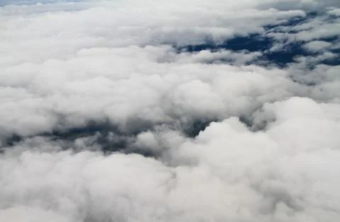 Clouds. view from the window of an airplane flying in the clouds Stock Photos