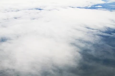 Clouds. view from the window of an airplane flying in the clouds Stock Photos