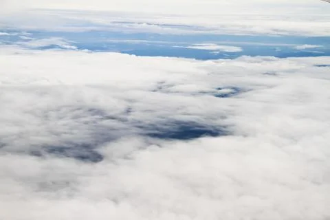 Clouds. view from the window of an airplane flying in the clouds Stock Photos