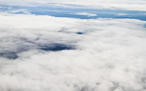 Clouds. view from the window of an airplane flying in the clouds Stock Photos