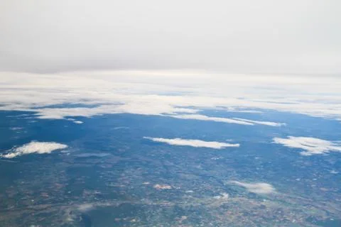 Clouds. view from the window of an airplane flying in the clouds Stock Photos