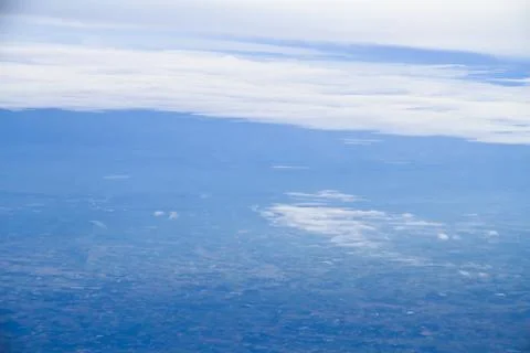 Clouds. view from the window of an airplane flying in the clouds Stock Photos