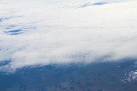 Clouds. view from the window of an airplane flying in the clouds Stock Photos