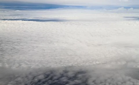 Clouds. view from the window of an airplane flying in the clouds Stock Photos