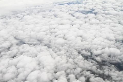 Clouds. view from the window of an airplane flying in the clouds Stock Photos