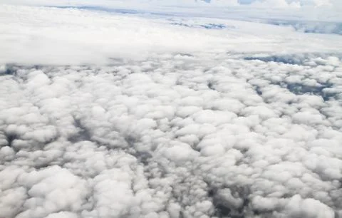 Clouds. view from the window of an airplane flying in the clouds Stock Photos