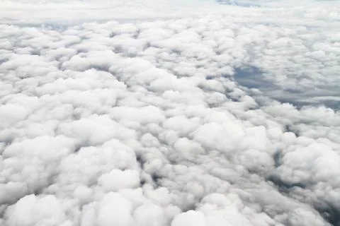 Clouds. view from the window of an airplane flying in the clouds Stock Photos