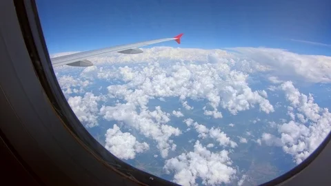 Clouds viewed from airplane window Stock Footage 94452072