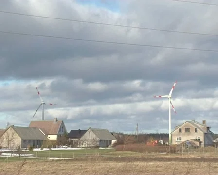 Clouds village windmills Stock Footage 10893042