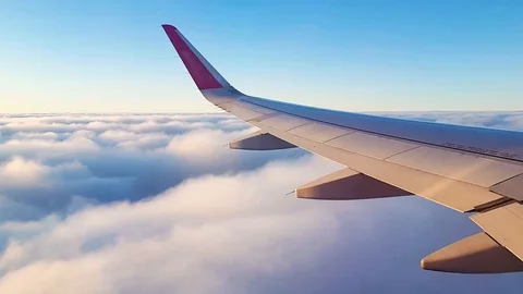 Clouds from a vindow of a jet airplane Stock Footage 128174617