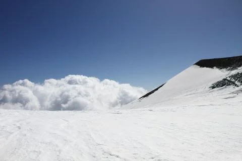 Clouds on volcano mount etna Stock Photos
