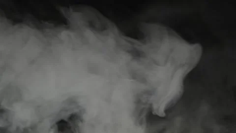 Clouds of white smoke or steam in dark 库存影片 321746790