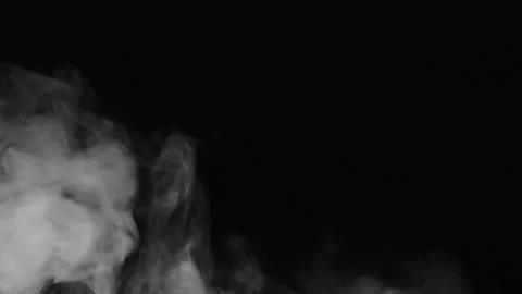 Clouds of white smoke streaming in dark 스톡 동영상 324805691