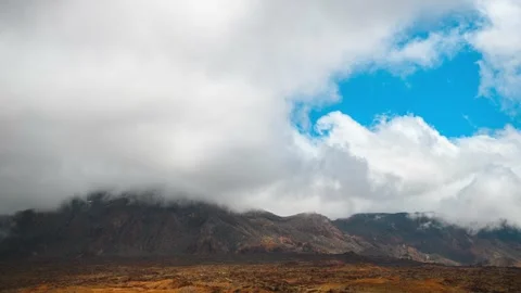 Clouds Wrapping Around Mountain Peak Volcanic Landscape Tenerife 4K Timelapse Stock Footage 334398975