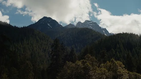 Clouds wrapping around mountains in North Cascades National Park Stock Footage 91337905